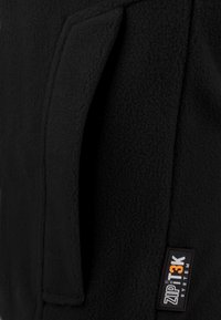 normani Outdoor Sports Ärmellose weste mit Seitentasche und Stehkragen Winterweste Bodywarmer - Weste - schwarz