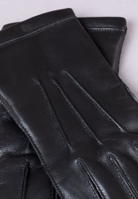 Black leather gloves with a smooth texture, featuring three stitched lines on the back and a snug fit at the wrist.
