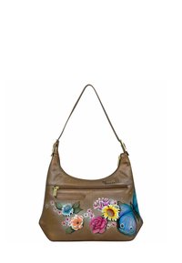 Bruine leren schoudertas met een ronde vorm, voorzien van kleurrijke bloemen- en vlinderontwerpen aan de ene kant, en een ritsvak.