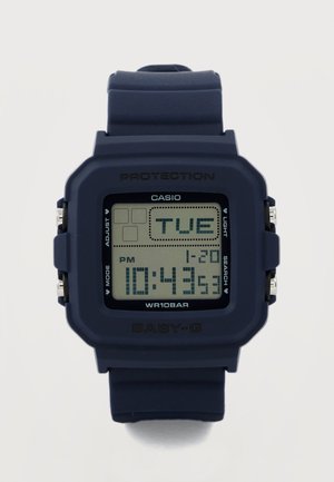 Ceas digital Casio Baby-G albastru închis, afișând ora 10:43:53 PM, data 20-01 și ziua marți pe ecran.