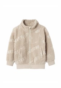 Bežna zip-up jakna iz mehke, teksturirane polarne tkanine z izbočenim vzorcem "AWESOME". Ima visok ovratnik ter elastične manšete in rob.