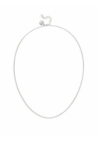 Collar en tono plateado con un diseño suave y flexible. Cuenta con un cierre de langosta y una cadena ajustable para variar las longitudes.