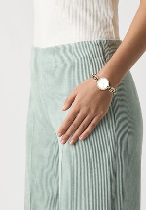 GLARE - Ura - gold-coloured