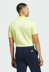 adidas Golf BASE BEYOND TEXTURED - Piké - pure sulfur