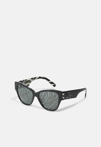 Geselecteerd, black on zebra