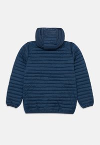 Veste matelassée bleu marine avec capuche, manches longues et poignets élastiques, présentée de dos sur un fond blanc.