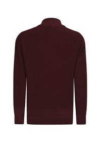 Burgundi värvi ribakiri, millel on kõrge krae, pikad varrukad ja struktuurne kangas. Lihtne disain, millel ei ole nähtavat riistvara ega aktsente.