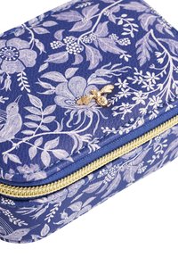 Blue leather zippered pouch with white floral and bird patterns, featuring a small gold bee embellishment on the top flap.