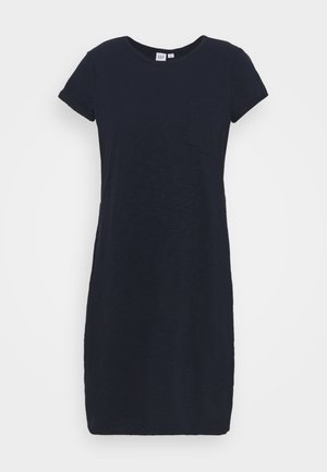 Navy blue T-shirt dress with short sleeves, round neckline, and a small chest pocket. Soft, textured fabric, knee-length design.