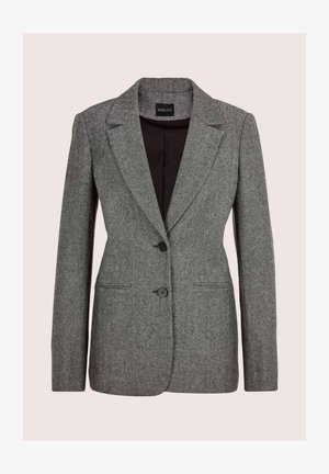 Grijze herringbone blazer met een notch-kraag, twee voorknopen en zijzakken. Gevoerd met zwarte stof voor contrast.