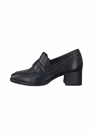 Mocassins à talons en cuir noir avec un bout arrondi, des détails de couture et un petit talon bloc. Texture lisse et accents de matériel minimalistes.