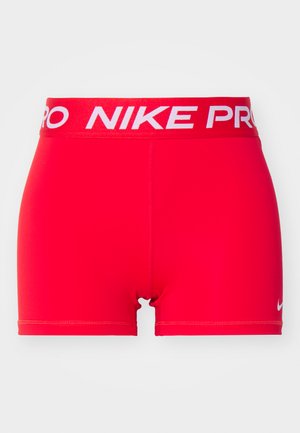 Røde treningstights med en hvit "NIKE PRO" logo på linningen. Stoffet er glatt og elastisk, designet for komfort og bevegelsesfrihet.