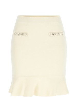 Gonna a maglia color crema con orlo svasato, caratterizzata da due tasche incorniciate da gioielli come accenti decorativi. Texture liscia e design aderente.