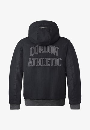 Schwarze Jacke mit Kapuze, mit "CORDON ATHLETIC" in großen gestickten Buchstaben auf dem Rücken. Graue gerippte Bündchen und Saum. Strukturiertes Material.