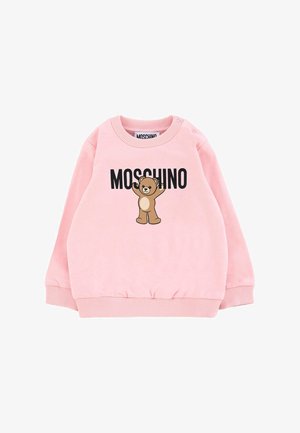 Różowa polarowa bluza z ściągaczami przy mankietach i u dołu, z nadrukiem kreskówkowego misia oraz tekstem "MOSCHINO" w czerni. Zapięcie na zatrzask na jednym ramieniu.