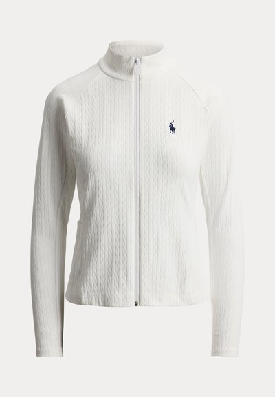 Λευκό πλεκτό μπουφάν με φερμουάρ, ψηλό γιακά, μακριά μανίκια, διακριτικό σχέδιο με πλεξούδες και μικρό κεντητό ναυτικό λογότυπο στο αριστερό στήθος.