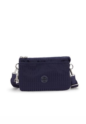 Navy blue nylon crossbody bag with a textured surface, featuring a zip closure, adjustable strap, and logo detail on the front.