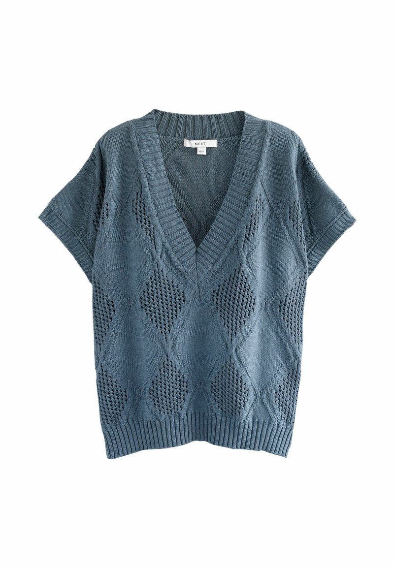 Jersey de manga corta y escote en V en azul empolvado. Tejido con patrones de diamantes y detalles de calados. Bajo y puños acanalados. Textura suave.