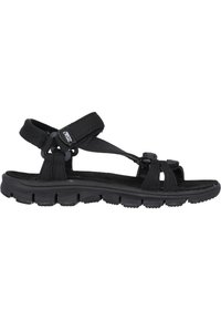 Black sandals featuring a soft fabric upper, adjustable straps, and a cushioned, textured sole with visible traction patterns.