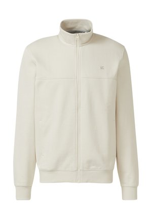 Veste intégrale à fermeture éclair de couleur blanc cassé avec col montant, poignets et ourlet côtelés, et petit logo brodé sur la partie supérieure gauche de la poitrine.