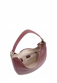 Bordeaux leren handtas met een ritsluiting, grote opening en een gestructureerde afwerking. Bevat een lichtgekleurde stoffen binnenkant met een klein vakje.