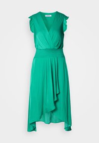 Green dress made of smooth fabric with a V-neck, short ruffled sleeves, smocked waist, and draped asymmetrical skirt.