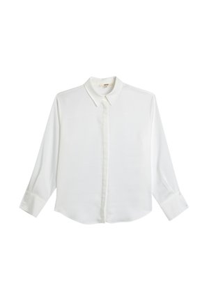 Camicia bianca a maniche lunghe con colletto classico, pattina frontale e polsini con bottoni. Tessuto liscio e leggero con orlo leggermente arrotondato.