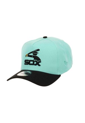 Turquoise cap with a black visor featuring an embroidered logo of a baseball player and "SOX" text below. Made from cotton fabric.