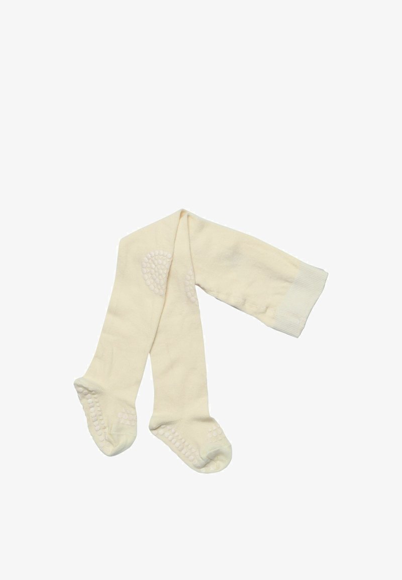 Kinderstrumpfhose in Cremefarbe mit rutschfesten Griffen an Füßen und Knien, flach auf einem weißen Hintergrund ausgelegt.