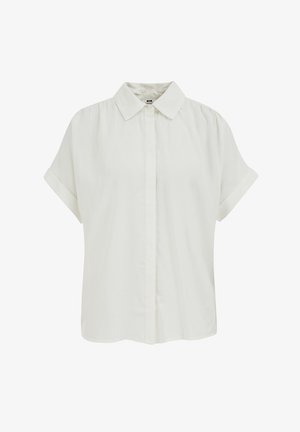 Balta īsroku blūze ar punktētu apkakli un noslēptu pogu aizdari, izgatavota no viegla auduma.