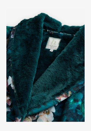 Giliai mėlynas dirbtinio kailio apykaklė ant gėlių rašto striukės, su Ted Baker London etiketė ir dydžio mažas žymė.