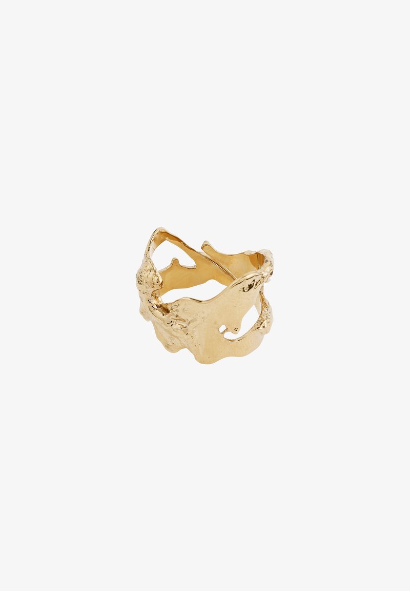 Bague couleur or avec un design abstrait, ondulé, ajouré et des surfaces texturées irrégulières.