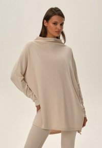 ESOTIQ JOYLAND piaskowy