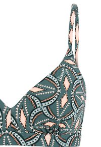 Trojuholníkový bikini top s ružovými, čiernymi a bielymi geometrickými vzormi a tenkým nastaviteľným ramienkom.