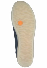 Sole boty s texturovaným béžovým gumovým povrchem; vlnitý vzor a oranžové kruhové logo; bok v černé barvě s elegantním designem.
