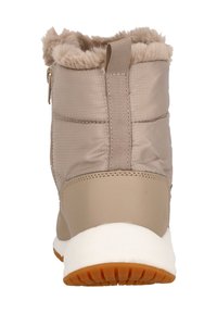 Beige isolierte Stiefel mit plüschigem Kunstfellbesatz, gepolstertem Obermaterial und einem gemusterten Textil. Verfügt über einen Reißverschluss und eine strukturierten Gummisohle.