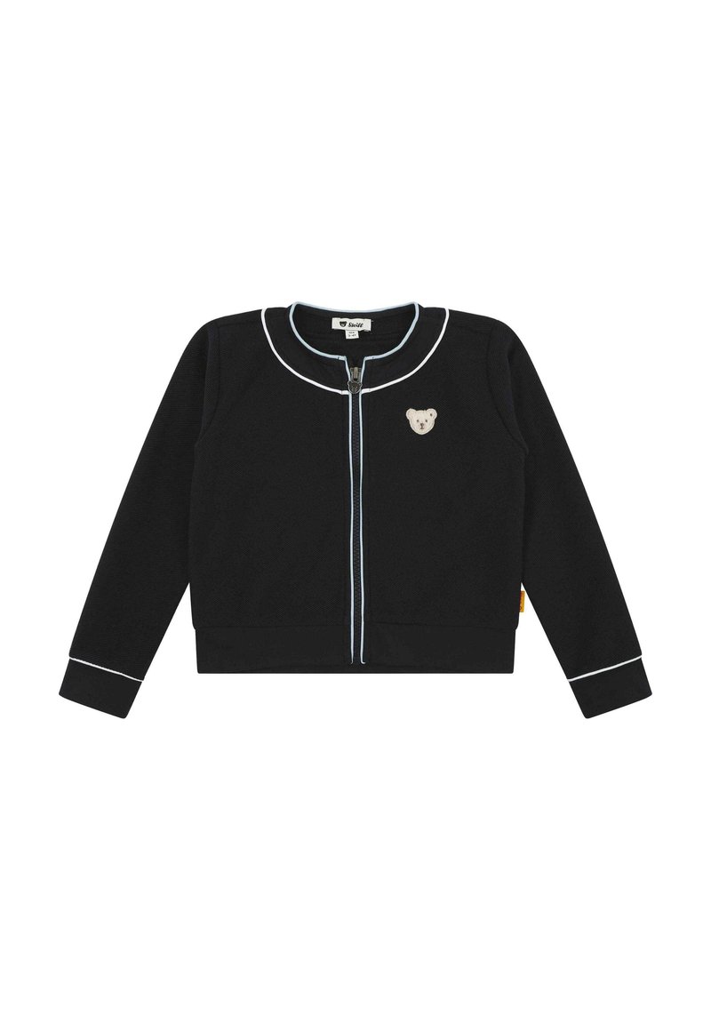 Schwarze Zip-Up-Trainingsjacke mit hellblauen Akzenten und Bärenapplikation auf der Brust. Verfügt über gerippte Bündchen und Kragen, weiche Textur.