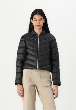 Black cropped puffer jacket with quilted chevron design, zip closure, and high collar. Smooth texture with long sleeves and subtle sheen.