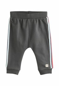 Grå sweatpants med elastisk talje, prydet med sidelister i lyseblå, rød og mørkeblå, samt et lille stjerne-label på kanten.