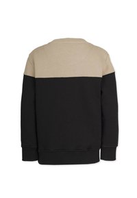 Svart och beige färgblockerad tröja med rund hals och ribbade muddar. Tillverkad av mjukt material, med en slät yta och minimalistisk design.