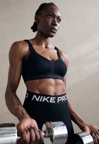 triaction by Triumph - ENERGY LITE NON-WIRED - High support sports bra - black Thumbnail Image 1