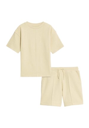 SET  - Träningsbyxor - pale yellow