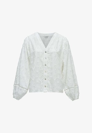 Blouse blanche à manches longues avec encolure en V, boutonnage sur le devant, manches bouffantes et motif brodé floral texturé sur toute la surface.