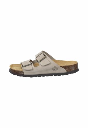 Beige suede slide sandal with two adjustable straps, cork midsole, and textured rubber sole. Features a spiral logo on the side.