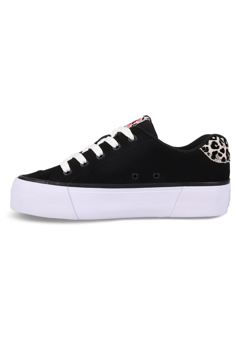 Black sneaker with white laces, a thick white sole, and a leopard print accent at the back. Smooth material and low-top design.