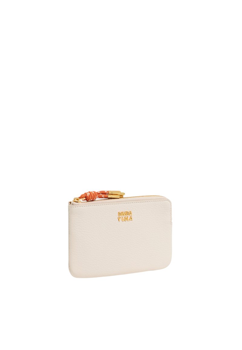 Zip wallet in soft cream leather with gold hardware and an orange accent. Features a logo embossed on the front. Slim and rectangular shape.