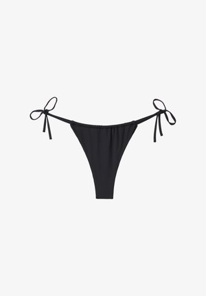 Parte inferior de bikini negra con lados ajustables de lazo, cobertura mínima y textura suave. Diseñada en una forma clásica de tanga.
