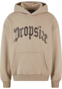 Beige Kapuzenpullover mit Kängurutasche, ausgestattet mit einem großen schwarzen "Dropsize"-Logo in einer stilisierten Schriftart über der Brust. Weicher Stoff.