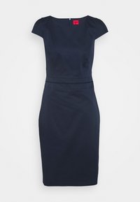 Robe ajustée bleu marine avec des manches courtes, longueur au genou et une fermeture éclair cachée au dos. Présente un tissu texturé et une taille définie.