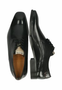 Scarpe eleganti in pelle nera con finitura liscia, punta affusolata e design con lacci. Presentano un piccolo tacco e un'etichetta interna con il marchio.